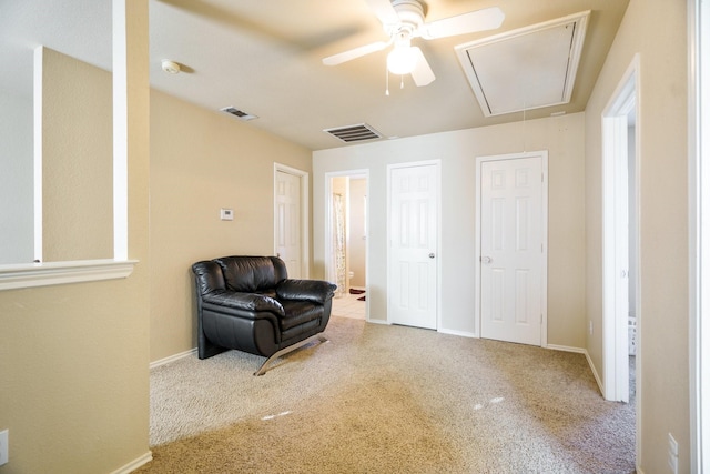 sitting room featuring carpet floors