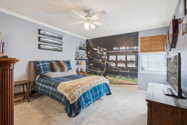 bedroom featuring crown molding, carpet flooring, and ceiling fan