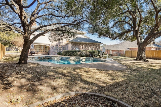 view of swimming pool featuring a patio