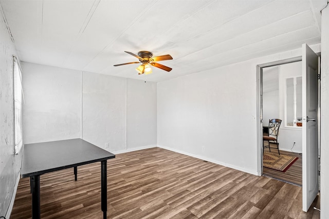 interior space featuring hardwood / wood-style flooring and ceiling fan