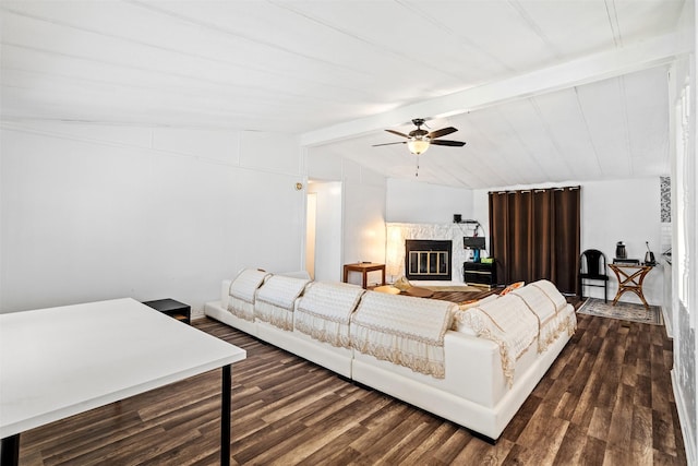 living room featuring dark hardwood / wood-style flooring, vaulted ceiling with beams, and ceiling fan