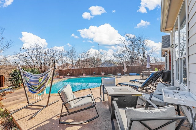 view of pool featuring a patio