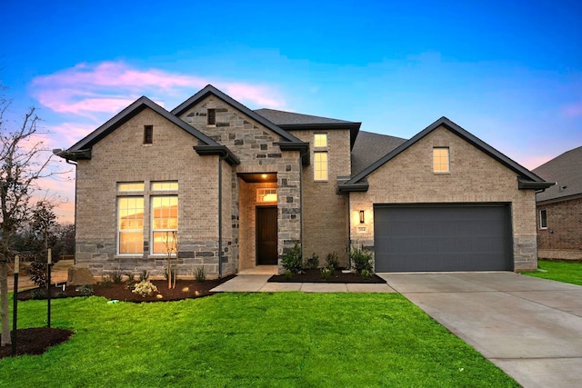 french provincial home featuring stone siding, a shingled roof, and a front lawn