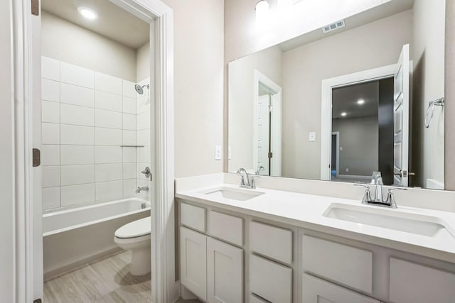 304 Alicia Ct, Mansfield, TX 76063 - full bathroom featuring toilet, double vanity, a sink, and visible vents
