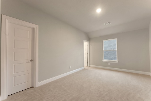 304 Alicia Ct, Mansfield, TX 76063 - spare room with lofted ceiling, visible vents, baseboards, and light colored carpet
