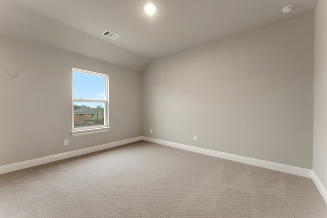 304 Alicia Ct, Mansfield, TX 76063 - empty room featuring visible vents, baseboards, vaulted ceiling, and carpet flooring
