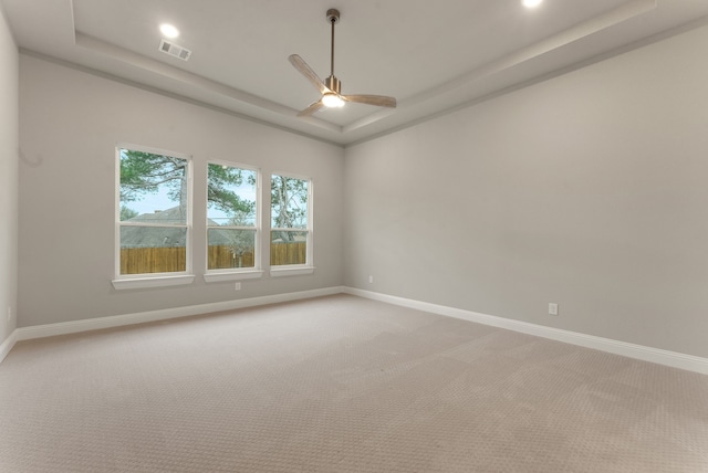 304 Alicia Ct, Mansfield, TX 76063 - empty room featuring baseboards, a tray ceiling, and light colored carpet