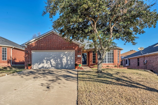 ranch-style house with a garage and a front lawn