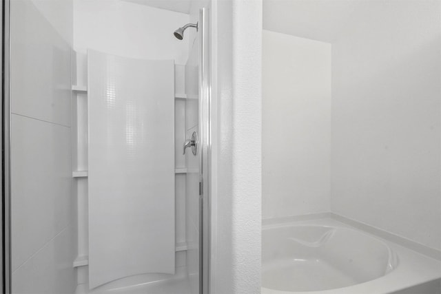 bathroom featuring walk in shower