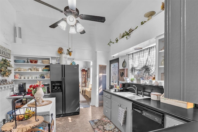 kitchen with sink, ceiling fan, gray cabinetry, black dishwasher, and stainless steel refrigerator with ice dispenser