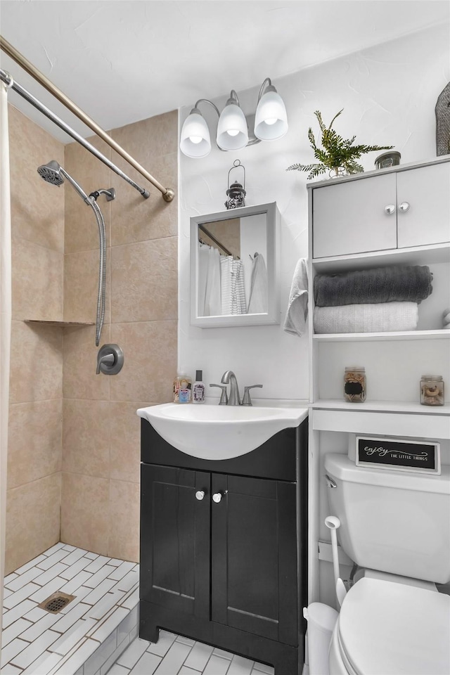 bathroom with vanity, a shower with curtain, and toilet