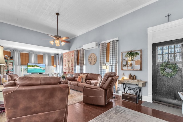 living room with ceiling fan, an AC wall unit, lofted ceiling, and dark hardwood / wood-style flooring