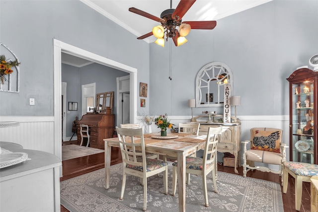 dining room featuring ornamental molding and ceiling fan