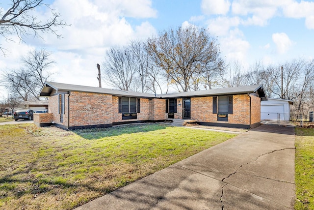 ranch-style home featuring a front yard