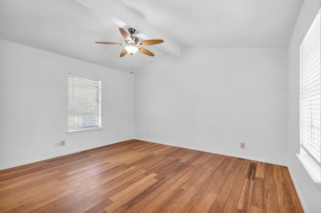 empty room with light hardwood / wood-style flooring, lofted ceiling with beams, and ceiling fan