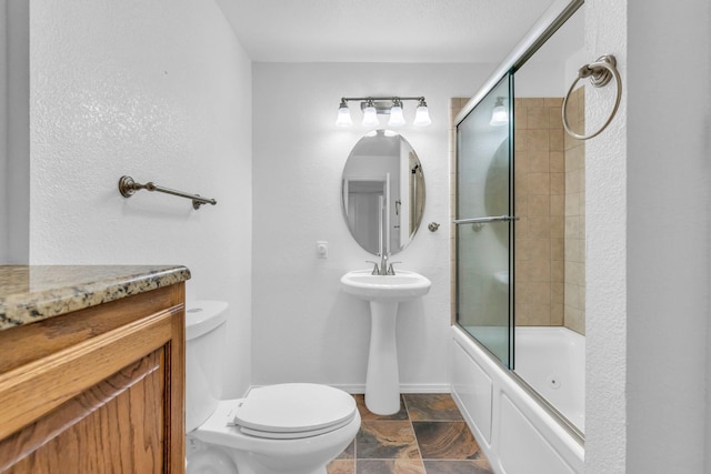 bathroom featuring enclosed tub / shower combo and toilet