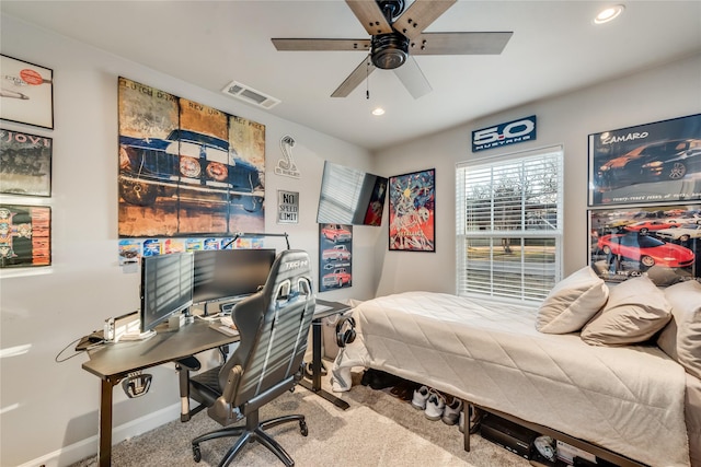 carpeted bedroom featuring ceiling fan