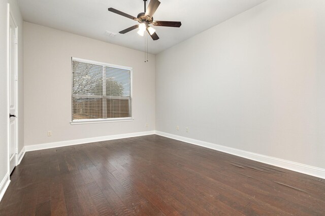 unfurnished room with plenty of natural light and dark hardwood / wood-style flooring