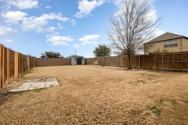 rear view of property featuring a patio and a lawn