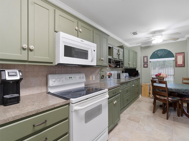 kitchen featuring crown molding, white appliances, ceiling fan, backsplash, and green cabinetry