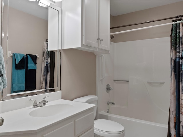 full bathroom with vanity, shower / bath combination with curtain, and toilet