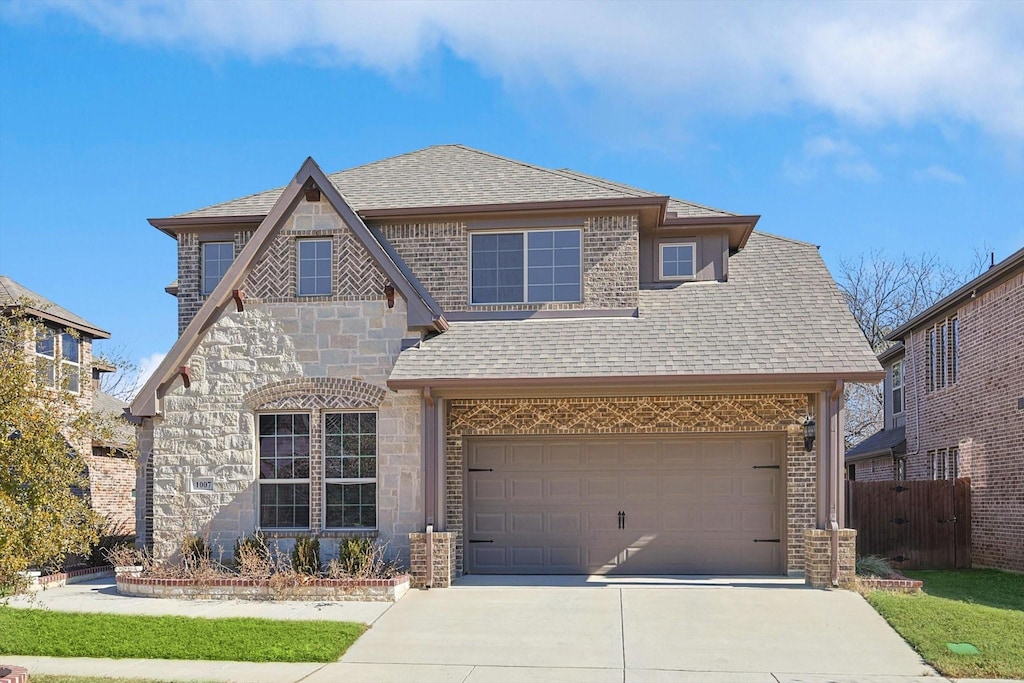 view of front of property featuring a garage