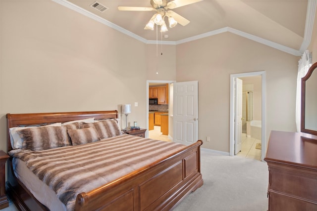 bedroom with ensuite bathroom, ornamental molding, light carpet, and ceiling fan