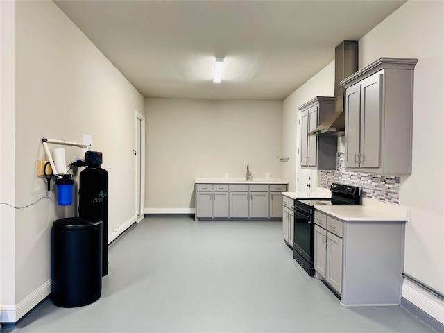 kitchen with gray cabinets, black electric range oven, sink, and decorative backsplash