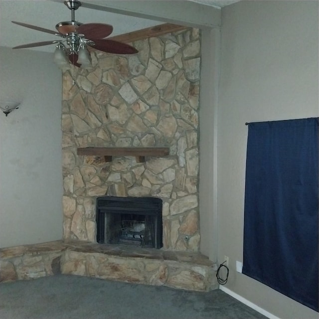 unfurnished living room with ceiling fan and a fireplace