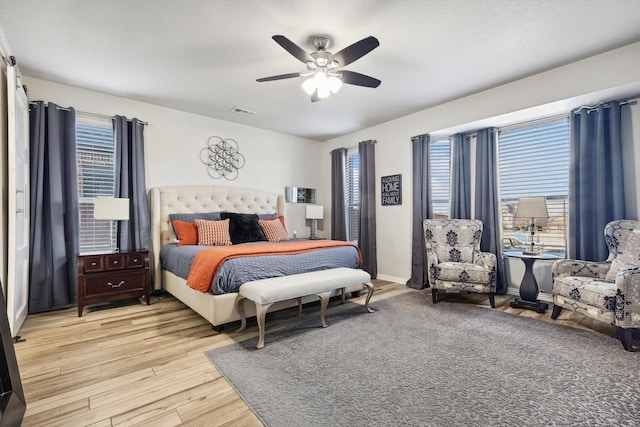 bedroom featuring ceiling fan and light wood-type flooring