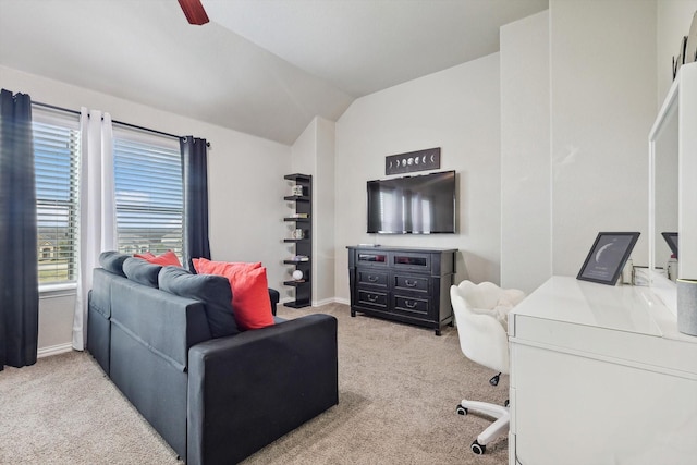 living room with lofted ceiling, light carpet, and ceiling fan