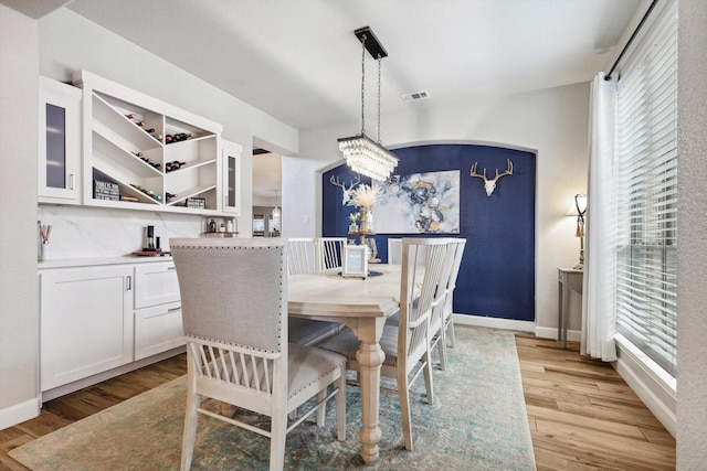 dining space featuring light hardwood / wood-style flooring