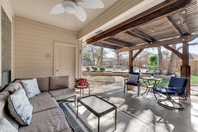 view of patio featuring an outdoor living space, a pergola, and ceiling fan