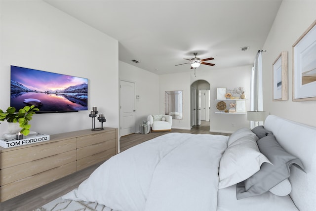 bedroom featuring dark wood-type flooring and ceiling fan