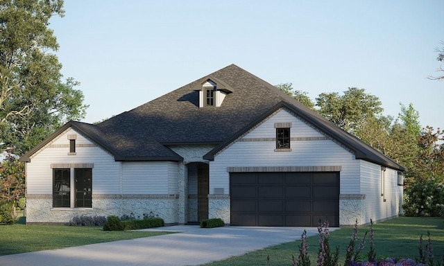 view of front facade with a garage and a front yard