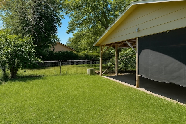 1234 N Travis St, Sherman, TX 75092 - view of yard featuring central AC and a patio