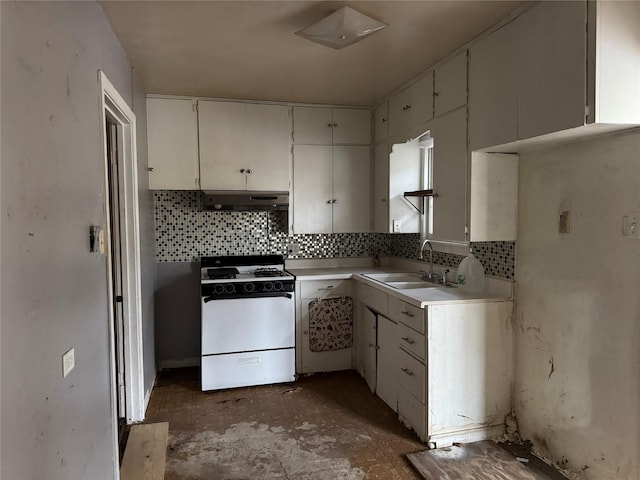 kitchen featuring white cabinetry, sink, decorative backsplash, and gas range gas stove