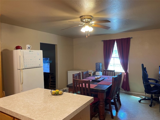 dining area with ceiling fan