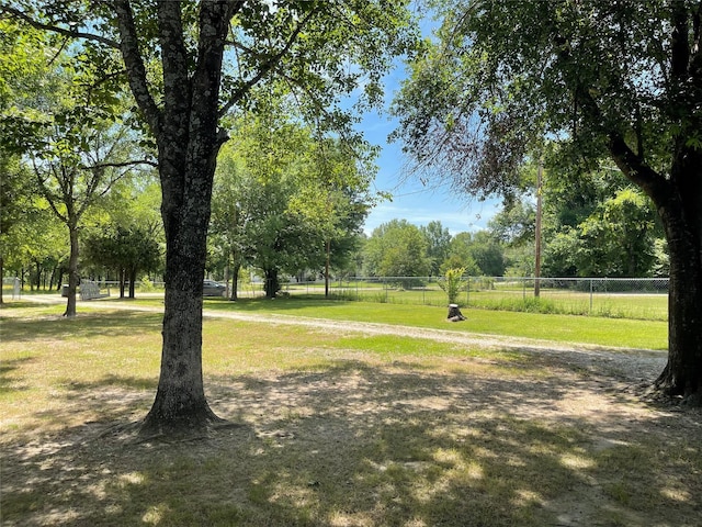 surrounding community featuring a lawn