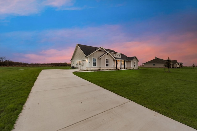 view of front of property with a lawn