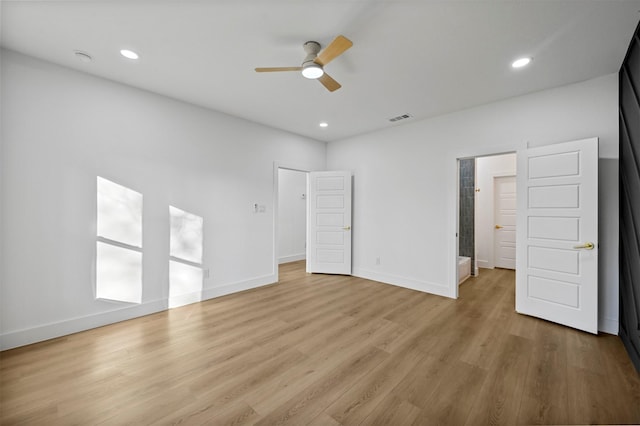 unfurnished bedroom featuring light wood-type flooring and ceiling fan