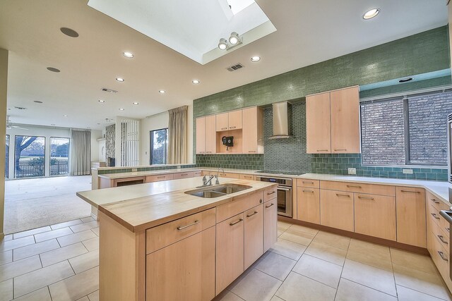 laundry area with light tile patterned flooring, gas dryer hookup, cabinets, washer hookup, and hookup for an electric dryer