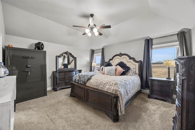 carpeted bedroom with lofted ceiling and ceiling fan