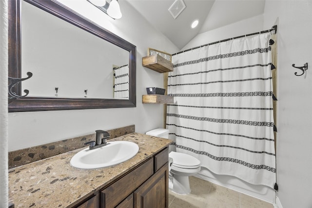 bathroom featuring vanity, curtained shower, vaulted ceiling, and toilet