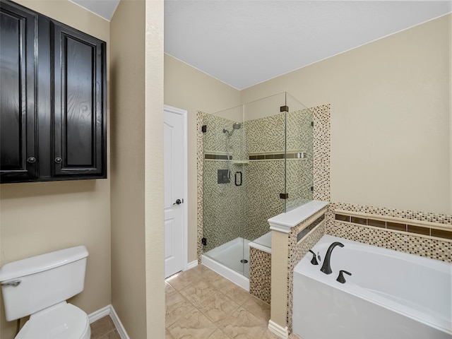 bathroom featuring toilet and independent shower and bath