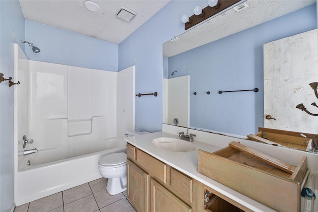 full bathroom featuring tile patterned flooring, vanity, a textured ceiling, bathtub / shower combination, and toilet