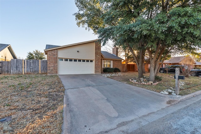 single story home featuring a garage