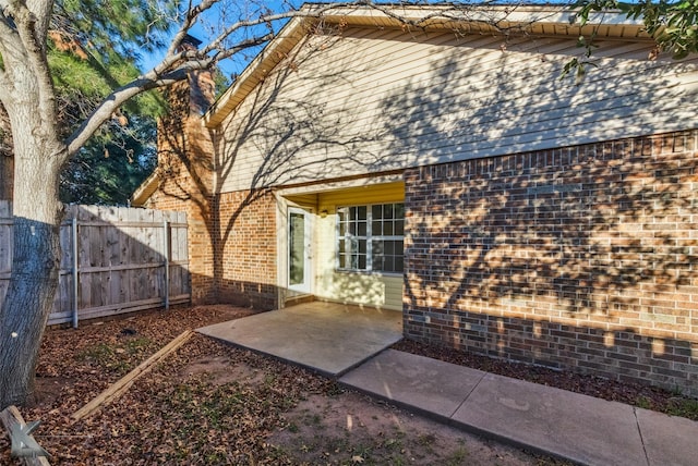 rear view of property with a patio area