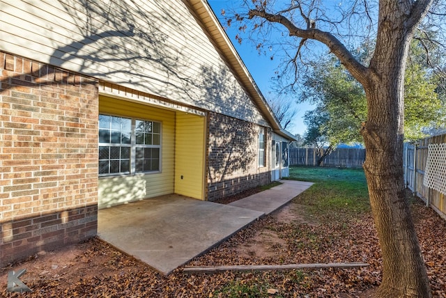 view of home's exterior with a patio