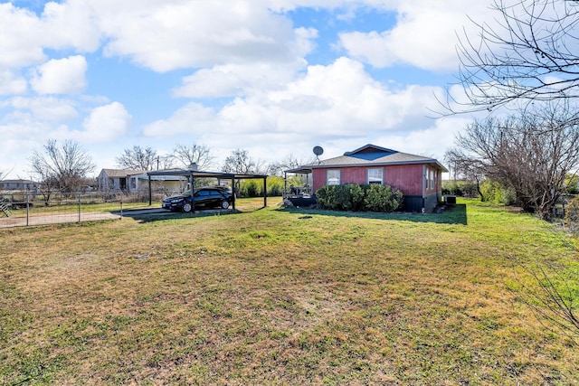 view of yard with a carport